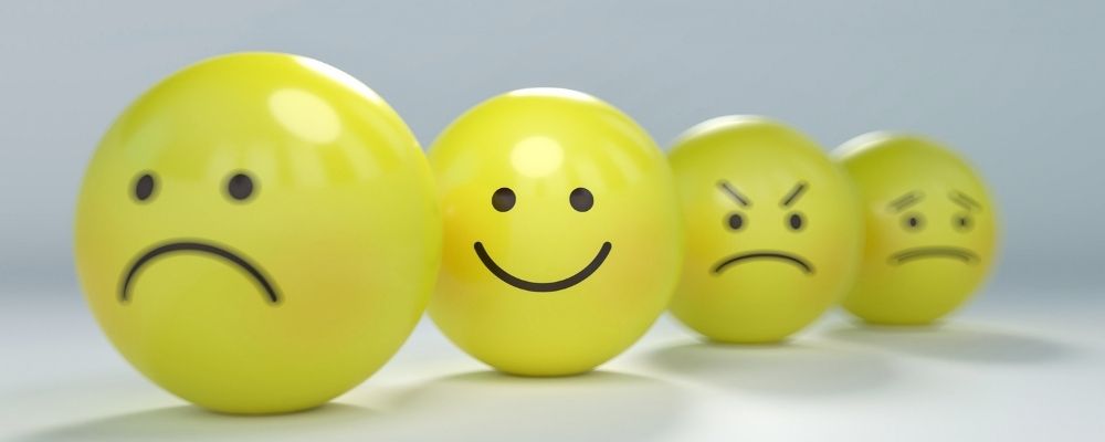 Vier smileys die allemaal een andere emotie tonen namelijk verdriet, blijheid, woede en bezorgdheid